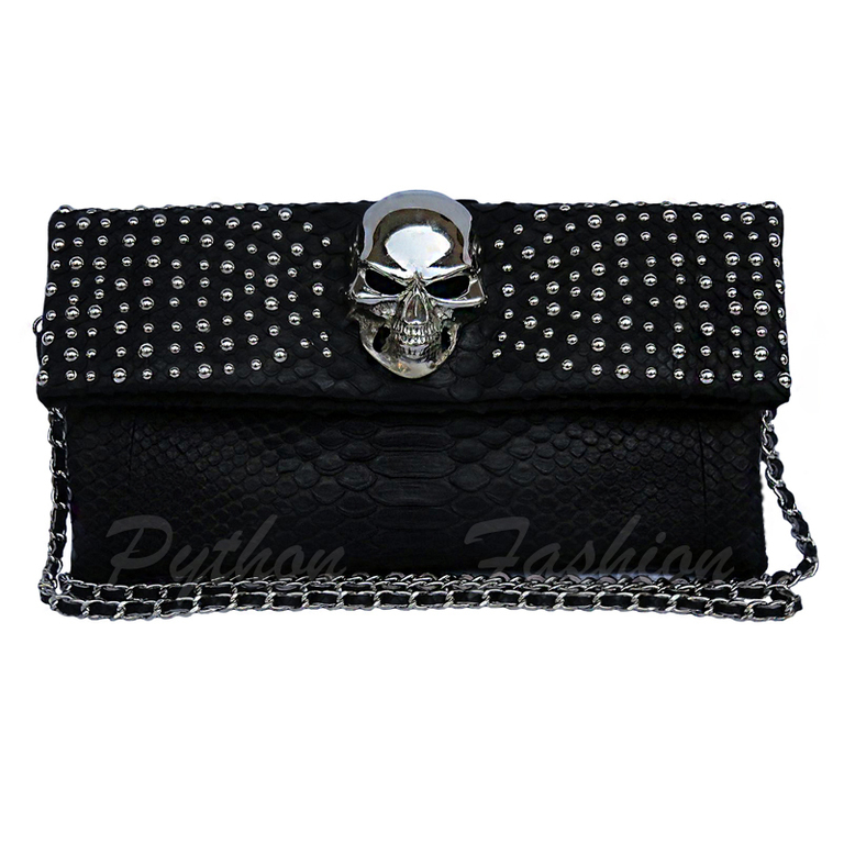 Clutch made from Python. Fancy clutch made from Python. The clutch is of Python with a skull. Designer clutch bag with chain handmade. Black clutch bag of Python. Clutch of Python. Fashion clutch hand