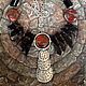 Necklaces, ethnic beads made of black agate and red Jasper in a free style boho. Eco-friendly, natural decoration with elements of vintage style.