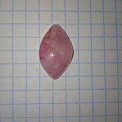 A cabochon of charoite backless