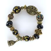 Украшения handmade. Livemaster - original item Bracelet with Falcon eye, a clay bead and a bead with the mantra. Handmade.