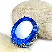 "Parallax" кольцо серебро с синим топазом