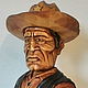 `Sheriff` - a decorative stopper for bottles, on a stand.
