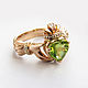 Gold ring with chrysolite