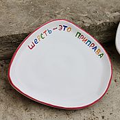 Посуда handmade. Livemaster - original item A curved plate ≈ 20 cm with a multicolored inscription Wool is a seasoning. Handmade.