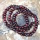 A necklace of red garnets

