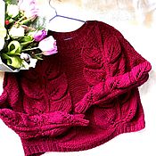 Pink women's sweater with handmade braids