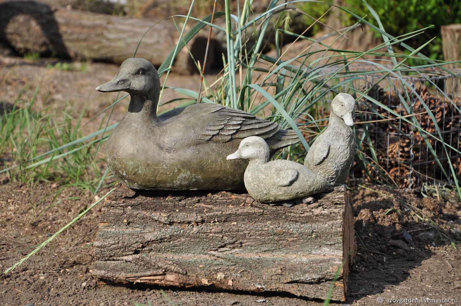 Duck with ducklings for a garden from concrete, concrete duck pond