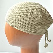 Hand-knitted women's hat made of linen and viscose silk