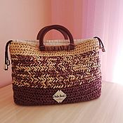 Crocheted bag with leather elements
