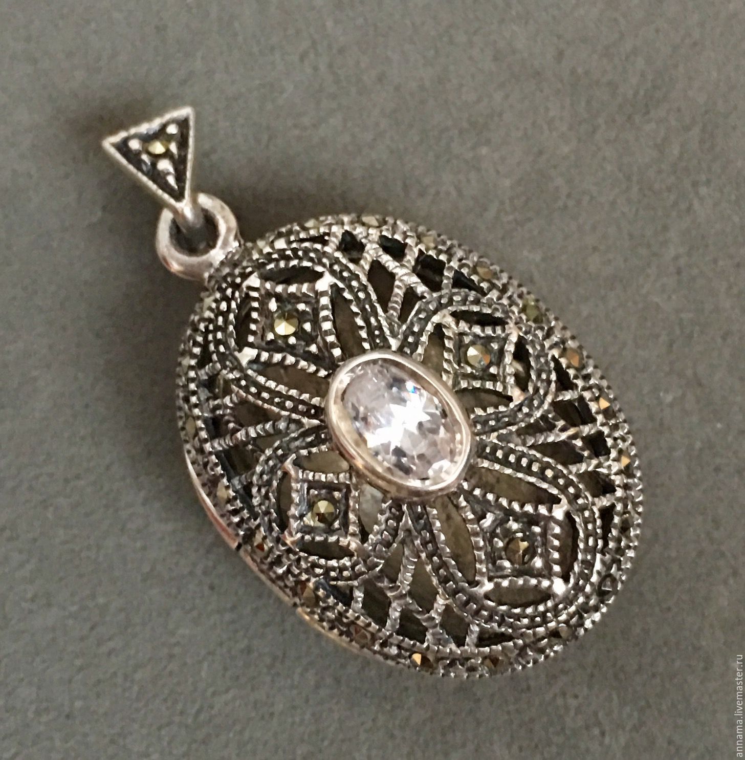Медальон открывающийся из серебра 925