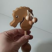 Куклы и игрушки handmade. Livemaster - original item Wooden rattle Seahorse with beads. Handmade.