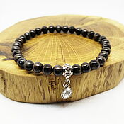 Украшения handmade. Livemaster - original item A bracelet made of nuummite is a talisman of the forest. Handmade.