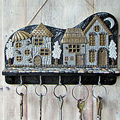 Key holders wall: Housekeeper-panel of a bird in the city.Wall-mounted housekeeper