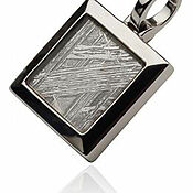 Pendant Amulet is made of steel and meteorite Gibeon