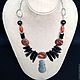 Necklaces, ethnic beads made of black agate and red Jasper in a free style boho. Eco-friendly, natural decoration with elements of vintage style.