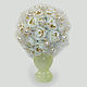 Flowers of pearls `Pearl inspiration` in a vase of onyx

