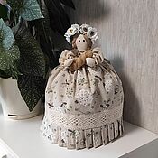Covers for dishes: Interior elements: a doll on a teapot
