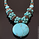 Striking necklace with a large Central element - turquoise pendant - a bright accent for completeness of the image.
