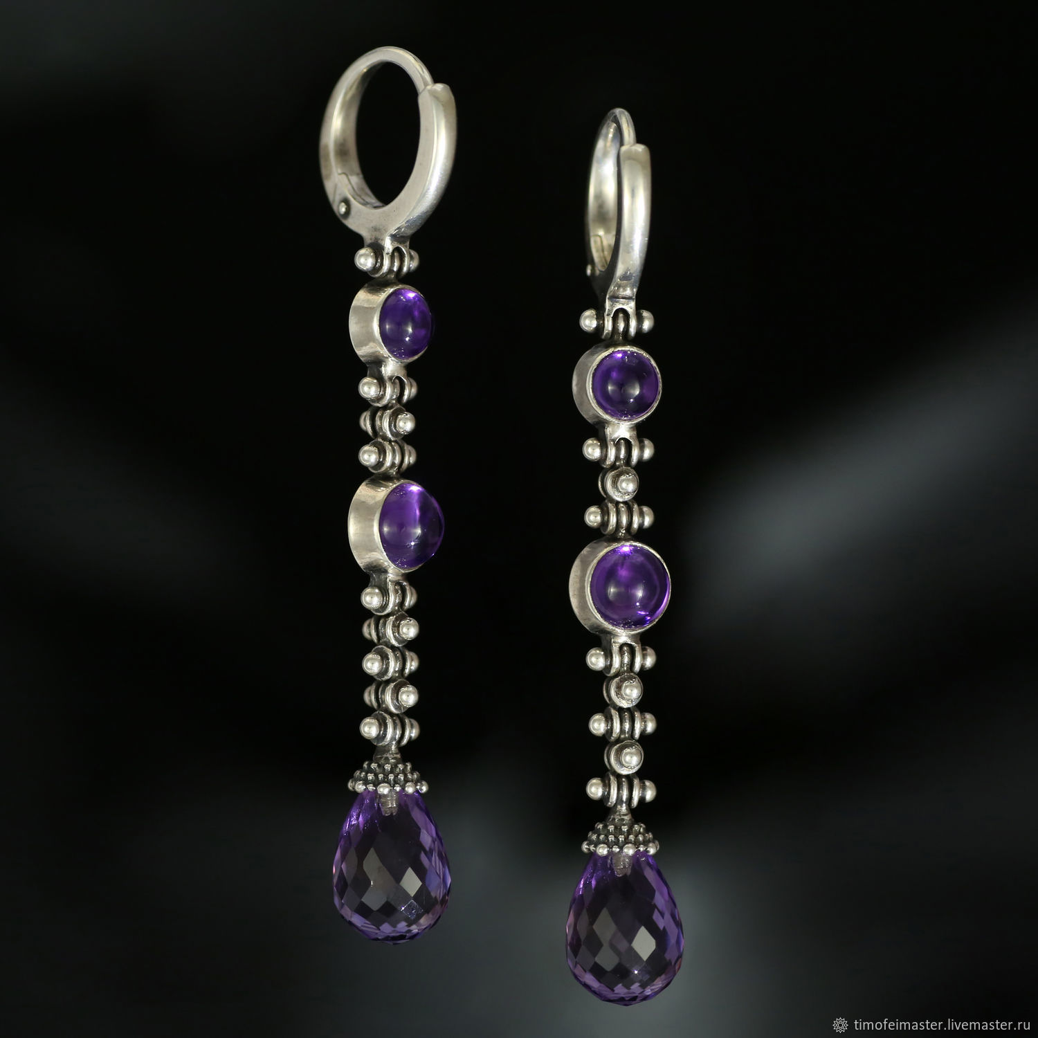 Серебряные серьги с фиолетовым камнем