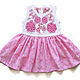 Dress for baby. Irish lace. Front view without belt
