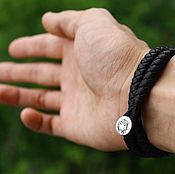 Laconic brown braided leather bracelet with ornament for men