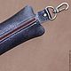Redbag stylish key holder made of genuine leather with carabiner.
