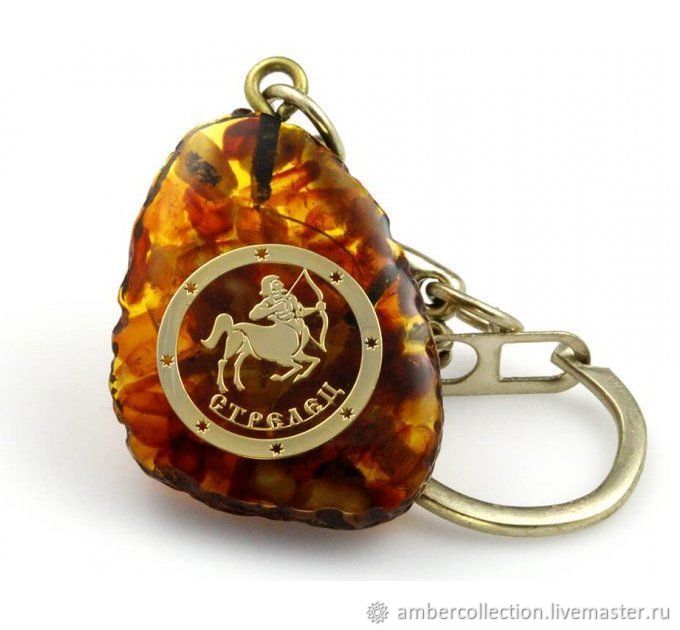 Стрелец статуэтка. Золотой кулон стрелец. Янтарь для стрельца. Подвеска знаки зодиака из янтаря. Янтарно-бронзовой шатенкой?.