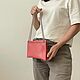 Handbag of the World made of leather with three compartments in the color grapefruit (pink)