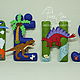 Sample name garland style `Dinosaurs`. Dinosaurs out of felt patterns.
