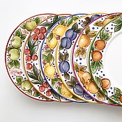 Plates: Painted porcelain, a collection of plates with clock Talavera