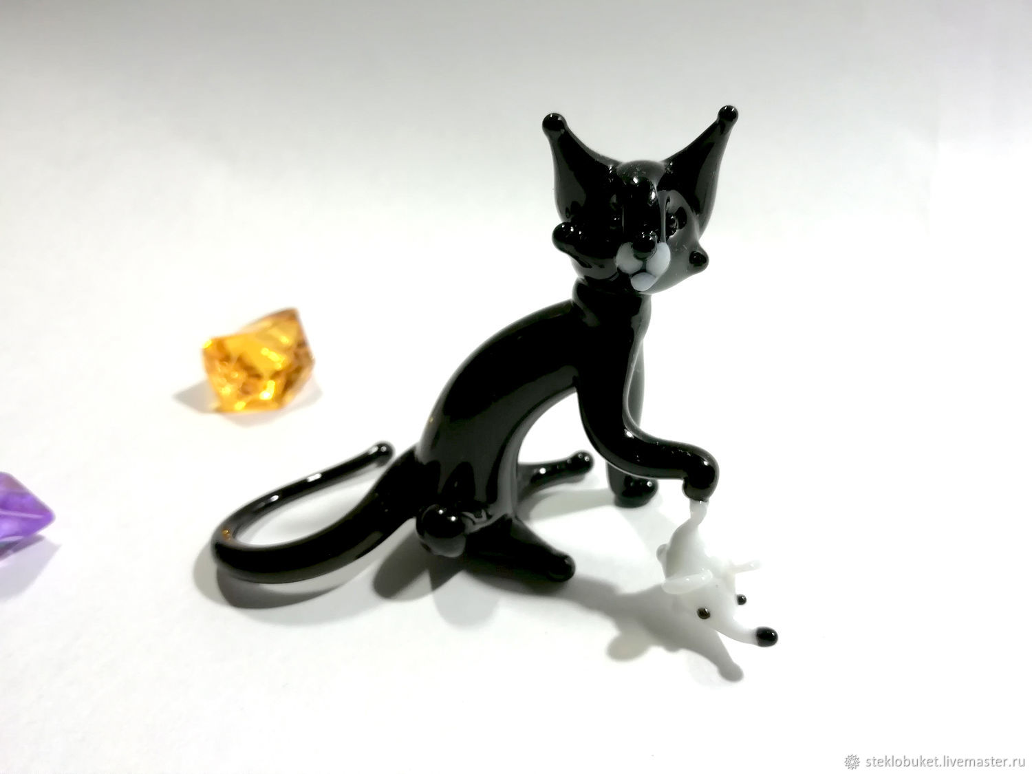 Кошка мышеловка черная
