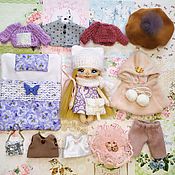 :  Play doll, doll with clothes, textile doll with a set of clothes