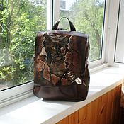 Author's leather backpack with painting