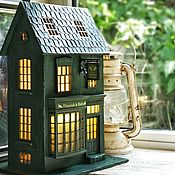 German house with an opening door and the room inside. Night light