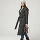 Warm coat graphite grey a versatile and fashionable at the same time. Goes well with dresses in the office and with jeans on vacation.Model's height 172, size 44
