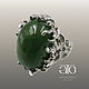 THE ONLY INSTANCE! Very beautiful ring with a green garnet!
