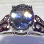 Серебряное кольцо с природным белым сапфиром и цирконами