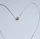 Minimalist decoration. necklace on the neck. Laconic decoration. Chain with pearls. Silver
