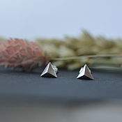 Unisex stud earrings. Pyramids of silver