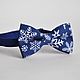 Christmas tie necktie beaming with snowflakes - buy tie necktie the man as a gift for new year, buy butterfly on a Christmas gift to a guy to buy a bow tie for new year
