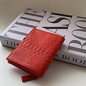 Red leather passport cover made of python skin