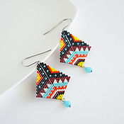 Bright beaded earrings with floral fringe