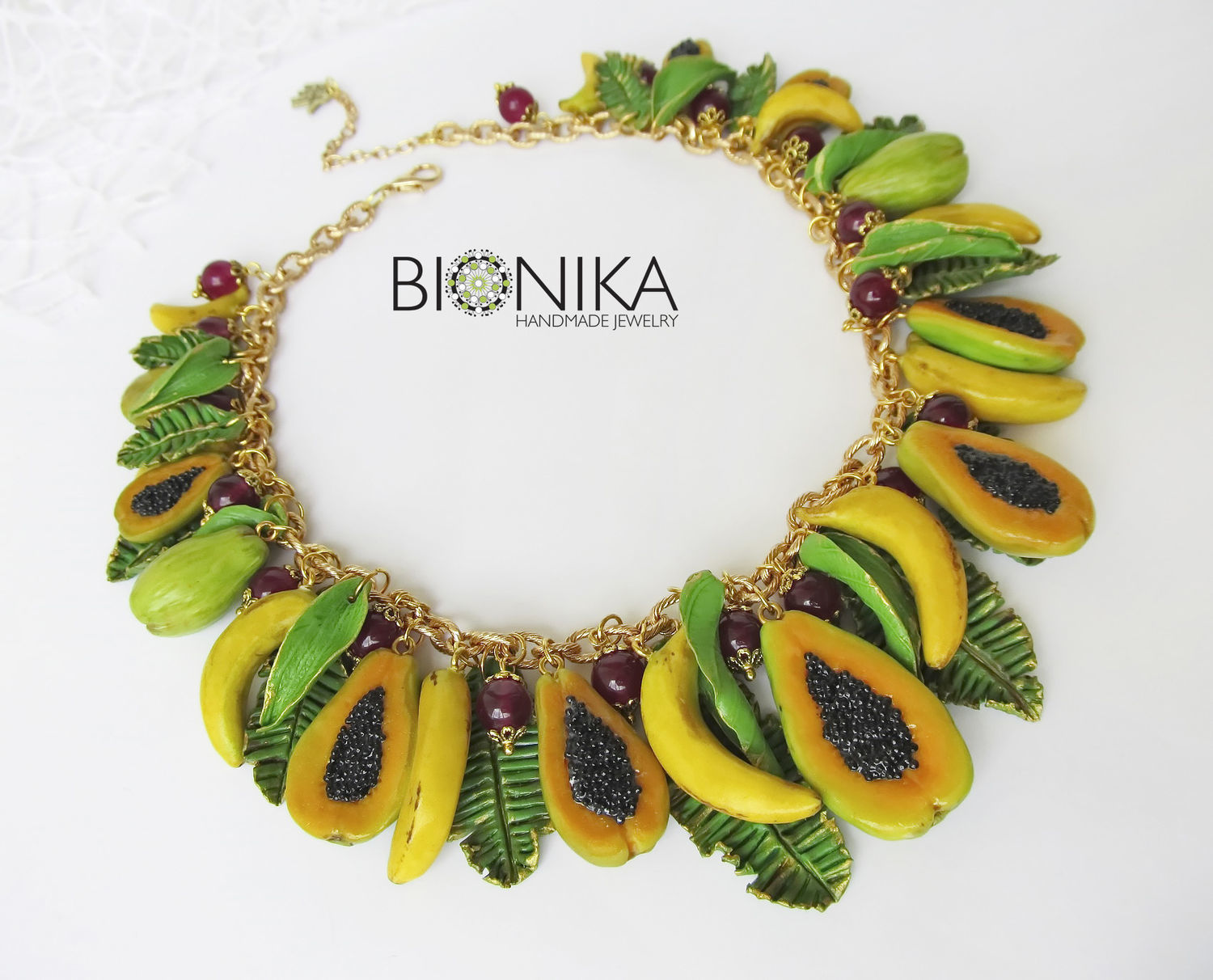 Fruit necklace with papaya and bananas made of polymer clay купить на