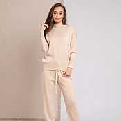 Одежда handmade. Livemaster - original item Beige women`s suit with a high neck for the road. Handmade.