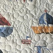 Quilted patchwork bedspread with houses