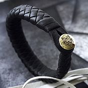 Украшения handmade. Livemaster - original item Black braided leather bracelet, with engraved runes on gold clasp. Handmade.
