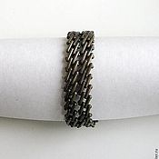 Metal bracelet with beads