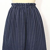 Green cotton short striped skirt with a leather belt