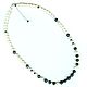 Necklace with natural pearls of white and black colors and with sapphires to buy at the Fair masters

