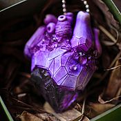 Pendant with purple dragon